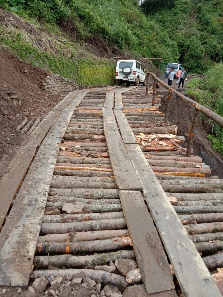Wood bridge connection between Mission & Rukizu colony